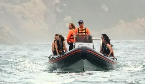 The Offshore Adventures boat heading out with guests aboard